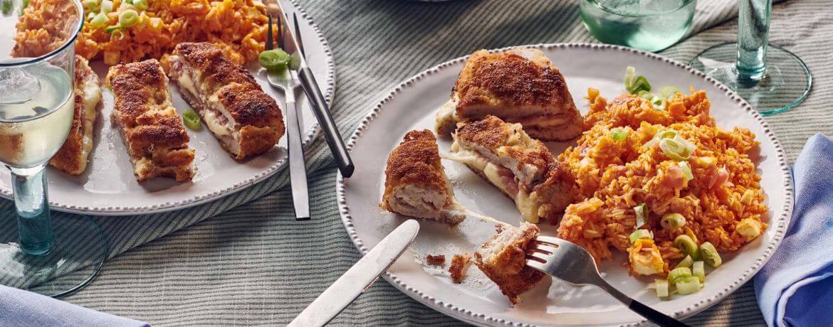 Cordon bleu aus Schweineschnitzel mit Serrano-Schinken und Mozarella auf Gemüse-Tomatenreis für 4 Personen von lidl-kochen.de