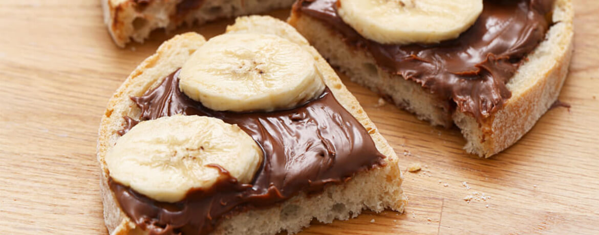 Belegte Brote mit Nuss-Nougat-Creme und Banane für 4 Personen von lidl-kochen.de