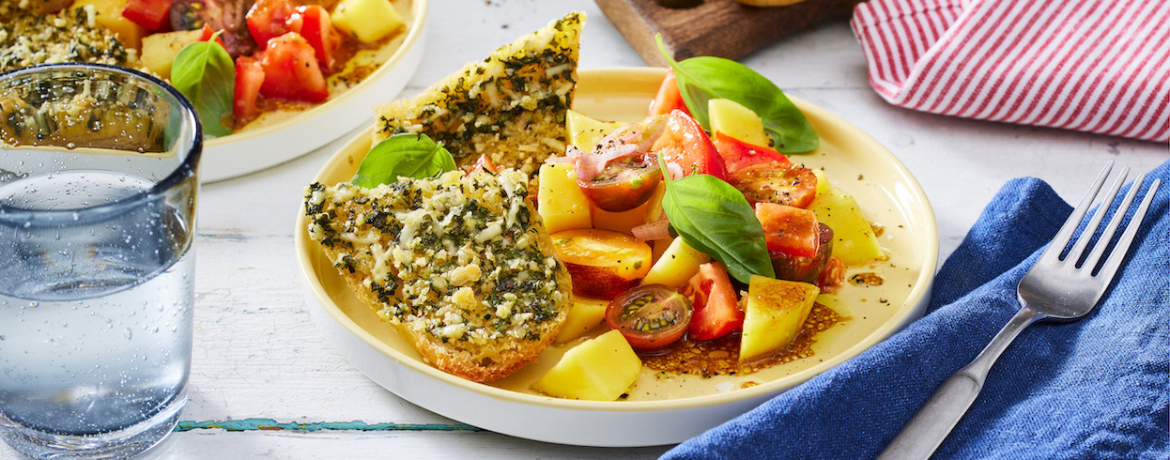 Tomaten-Mango-Salat mit Knoblauchbrot für 4 Personen von lidl-kochen.de