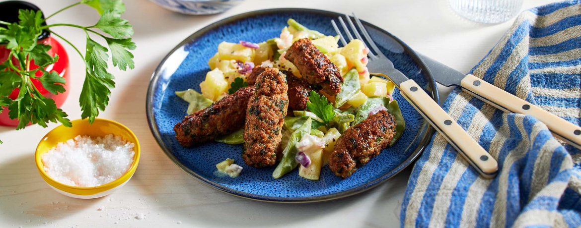 Hack-Röllchen mit buntem Kartoffel-Bohnen-Salat für 4 Personen von lidl-kochen.de