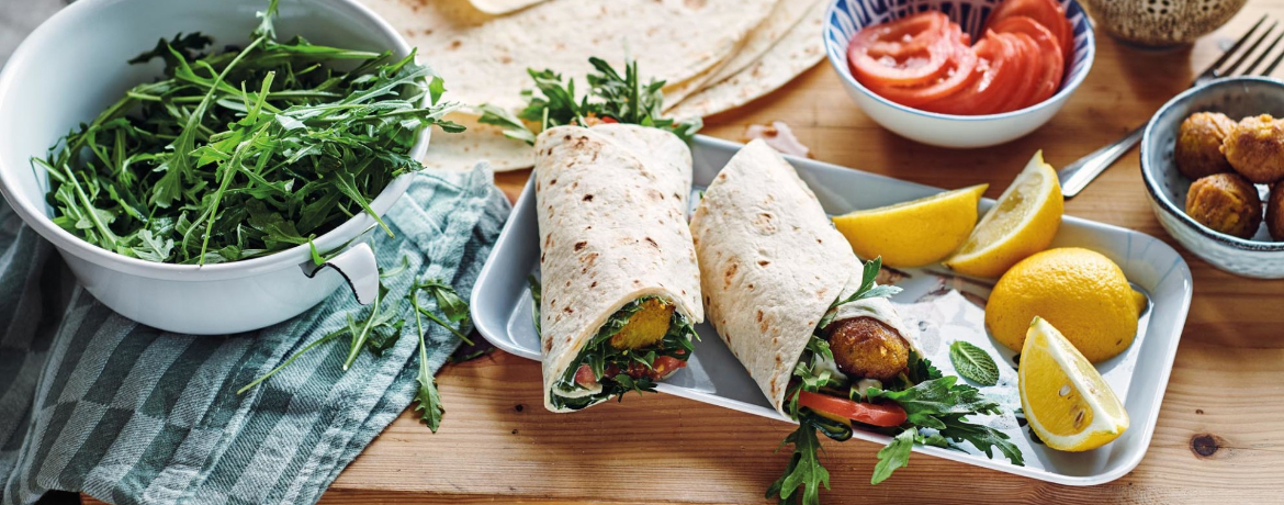 Vegane Falafel-Wraps mit Sojaghurt-Minz-Soße für 4 Personen von lidl-kochen.de