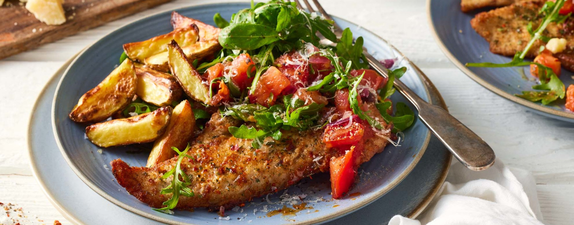 Peperoncinischnitzel mit mediterranem Röstkartoffelsalat und Rucola für 4 Personen von lidl-kochen.de