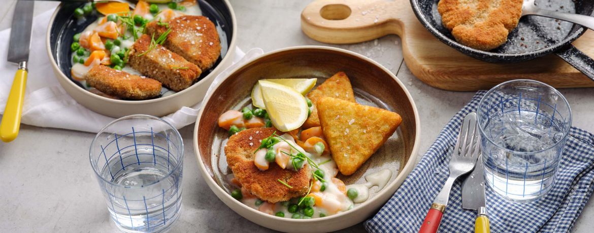 Haferflocken-Schnitzel mit cremigem Erbsen-Karotten-Gemüse und Rösti für 4 Personen von lidl-kochen.de