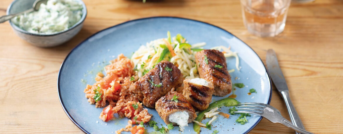 Bifteki mit Kraut-Salat, Zaziki und Tomaten-Reis für 4 Personen von lidl-kochen.de