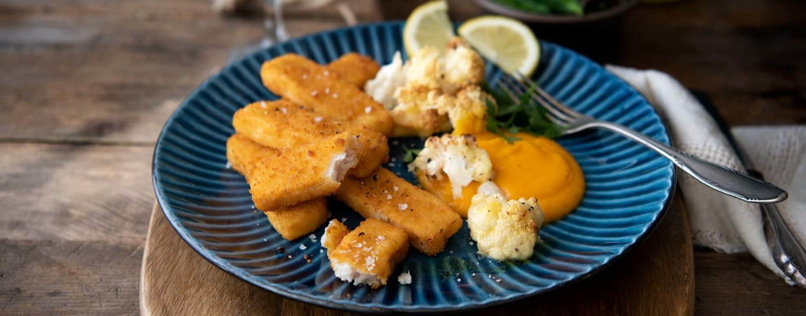 Fischstäbchen mit Kürbis-Kartoffelpüree und überbackenem Blumenkohl für 4 Personen von lidl-kochen.de