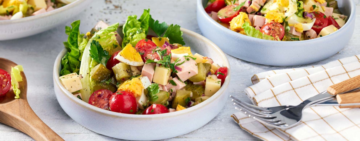 Wurstsalat von Geflügelwurst, Gouda-Käse und frischen Kräutern für 4 Personen von lidl-kochen.de