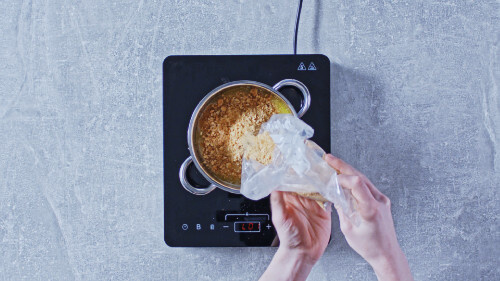 Dies ist Schritt Nr. 1 der Anleitung, wie man das Rezept Cheesecake mit Karamell-Popcorn zubereitet.