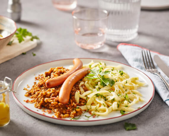 Linsen mit Spätzle und Würstchen