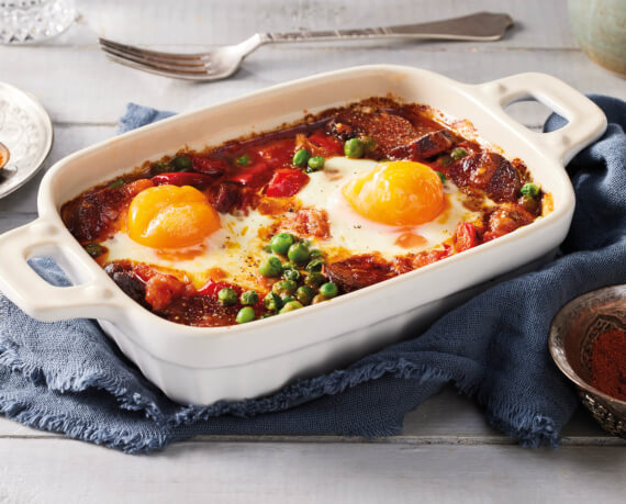 Eier aus dem Ofen in Tomaten-Sauce